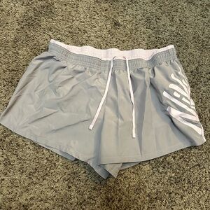VGUC Nike DriFit athletic shorts. Size XL. Grey with pink accents.